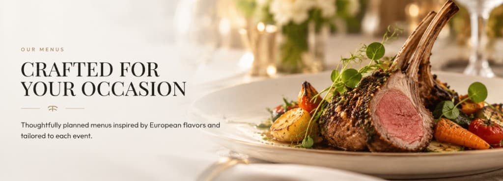 Herb-crusted lamb with roasted vegetables plated for a fine-dining course.